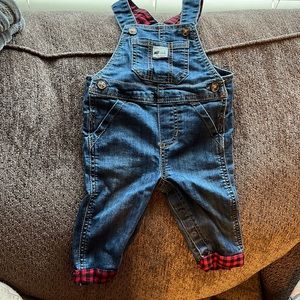 Overalls with red flannel material inside